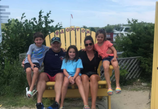 Picture of owner Tim O'Brien with his wife, Kerry, and their children