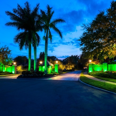 Color-changing lighting can be game changing for your HOA entrance and community. Photo