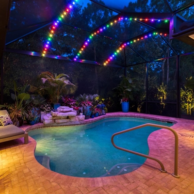 This lanai in Lakewood Ranch has permanent track lighting that is app-controlled and has millions of Photo