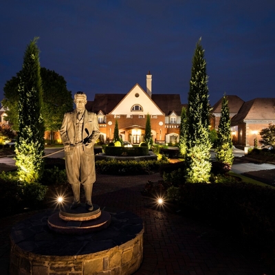 Outdoor lighting surrounding commercial space Photo
