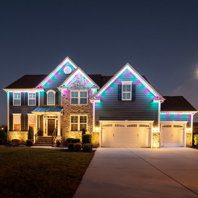 These Spring colors on permanent roofline lighting make it festive year-round. Photo