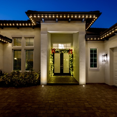 Permanent holiday lighting makes your home festive year-round! Photo
