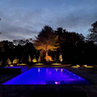 Lighting around Pool with Purple Lighting in Pool Photo