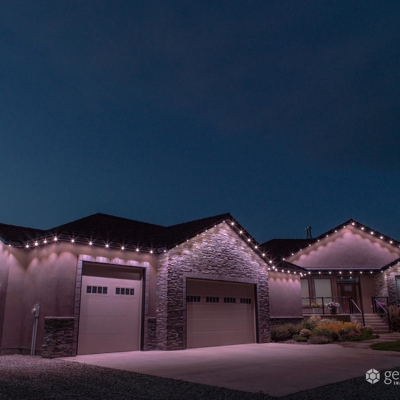 <p>Warm white architectural lighting add beautiful curb appeal to your home with permanent roofline  Photo