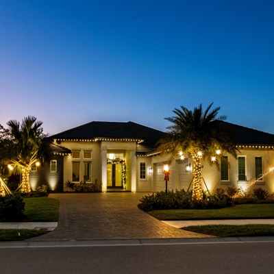 OLP can add roofline lighting, tree lighting and garland during the holidays to make your home festi Photo