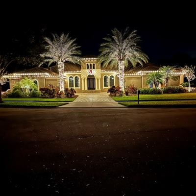 Add roofline and tree wrap lighting for the holidays to make your home festive during Christmas. Photo