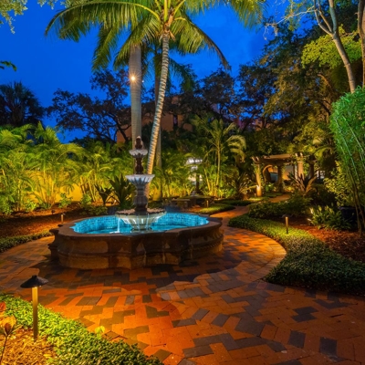 Landscape and pathway lighting allows residents at an HOA to navigate the property safely. Photo