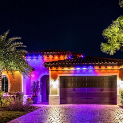Make your home festive for Halloween with permanent track lighting on the roofline of your home, eas Photo