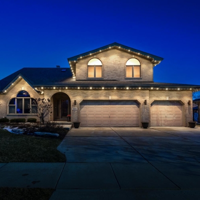 Yellow Exterior Roofline Lighting Photo