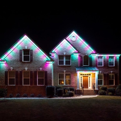 Pink and Green Exterior Roofline Lighting Photo