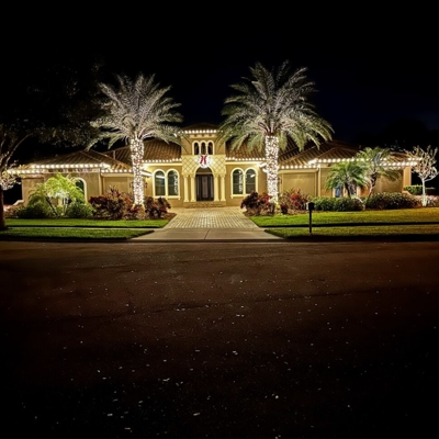  Add roofline and tree wrap lighting for the holidays to make your home festive during Christmas. Photo