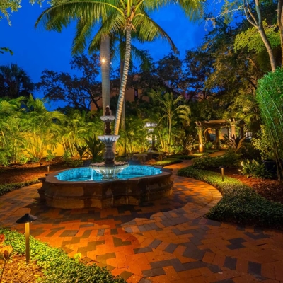 Landscape and pathway lighting allows residents at an HOA to navigate the property safely.  Photo
