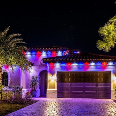 Celebrate 4<sup>th</sup> of July with permanent roofline lighting on your home in Dadeland. Photo