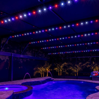 Celebrate 4<sup>th</sup> of July with permanent roofline lighting in your lanai in Miami, FL. Photo