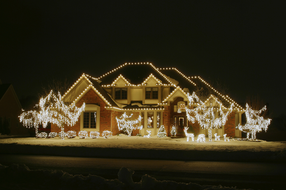 House with exterior Christmas lights installed