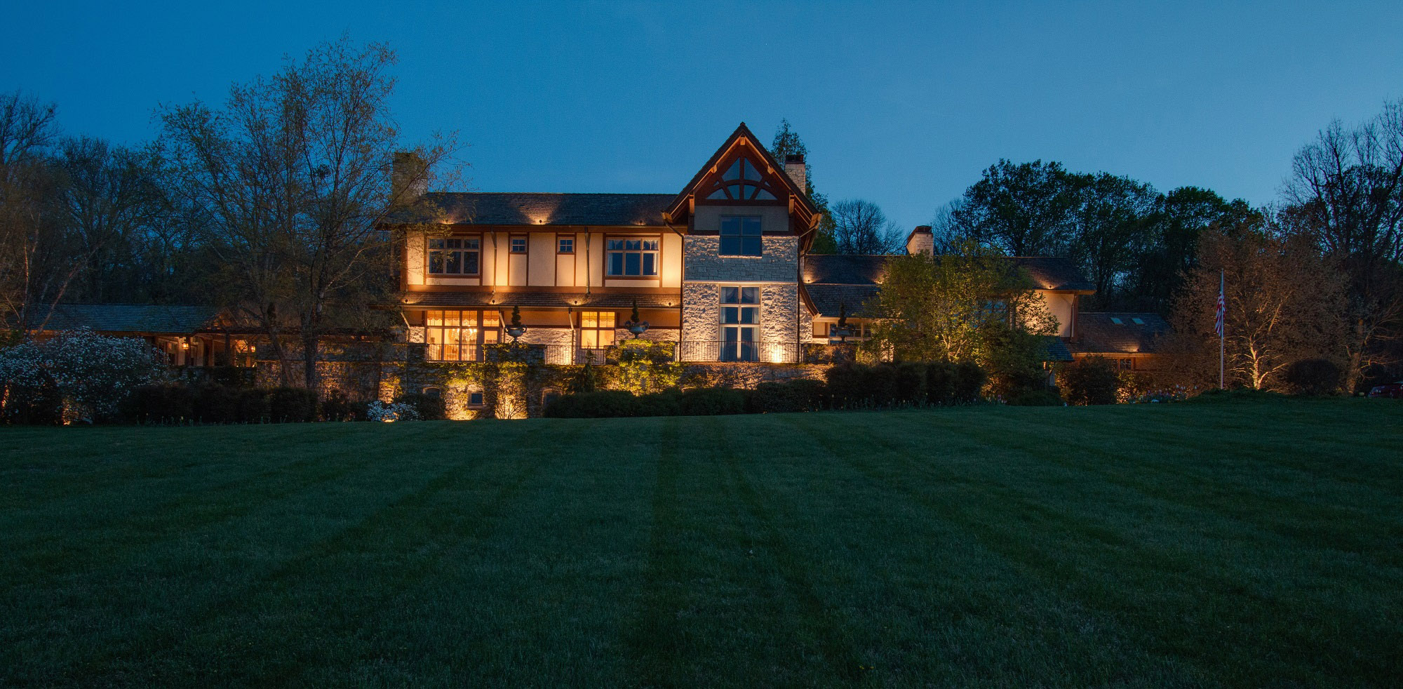 Landscape lighting in front of estate