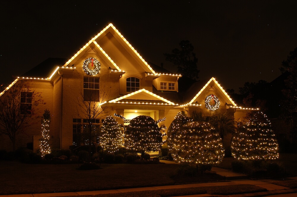 House with exterior Christmas lights installed