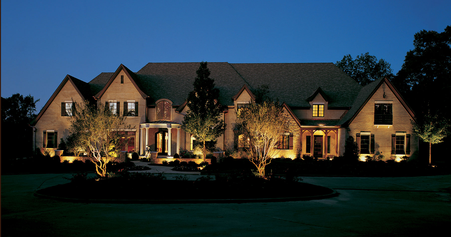 Exterior home with specialty lighting