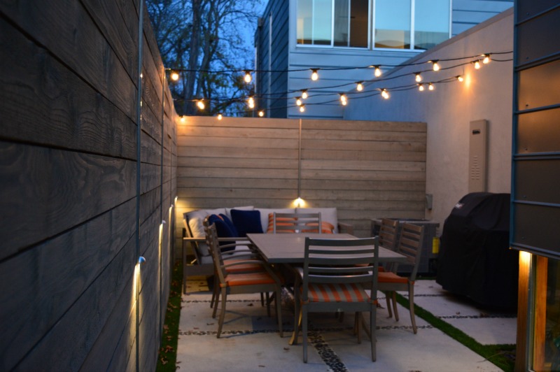 Backyard patio with market lights