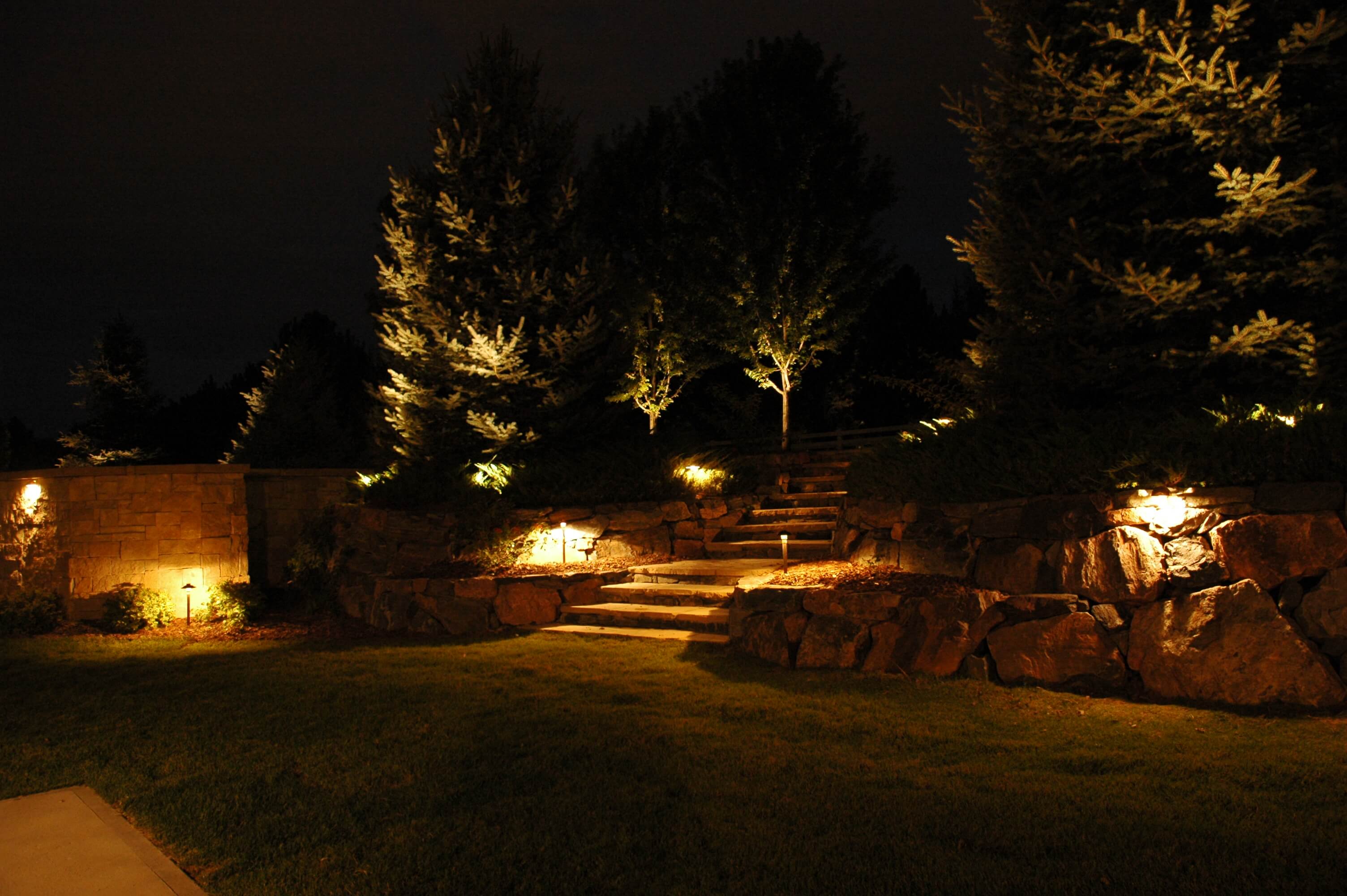 Lighted rock walls and trees