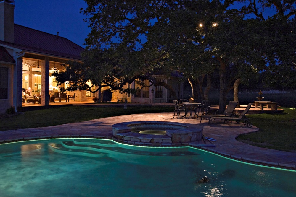 Backyard pool with lighting