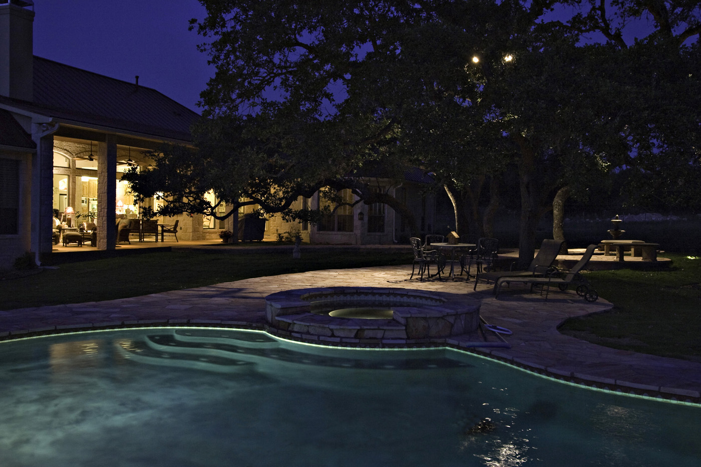 Backyard pool with lighting