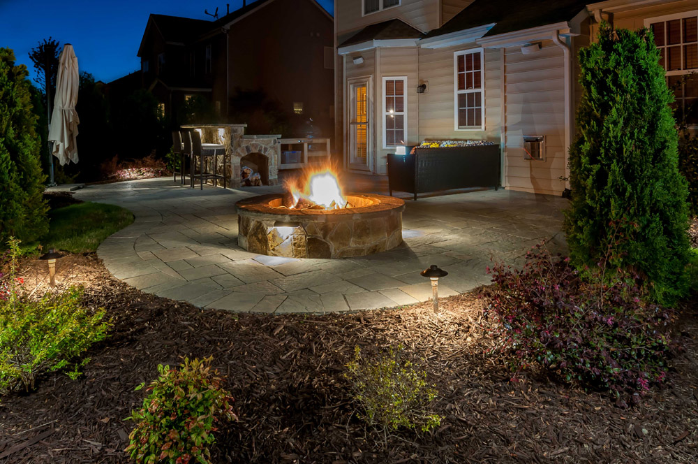 Patio and fire pit at night