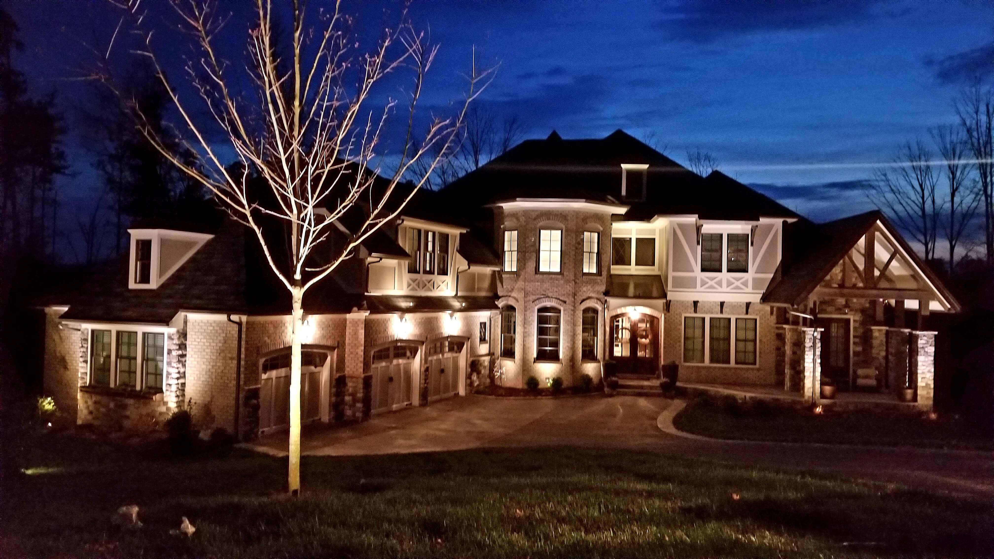 Exterior home with specialty lighting