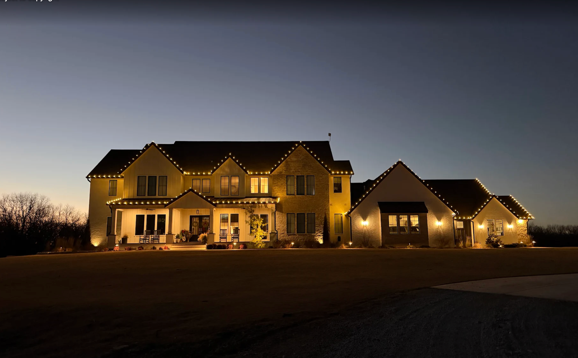 residential holiday permanent lighting on perimeter of the roof
