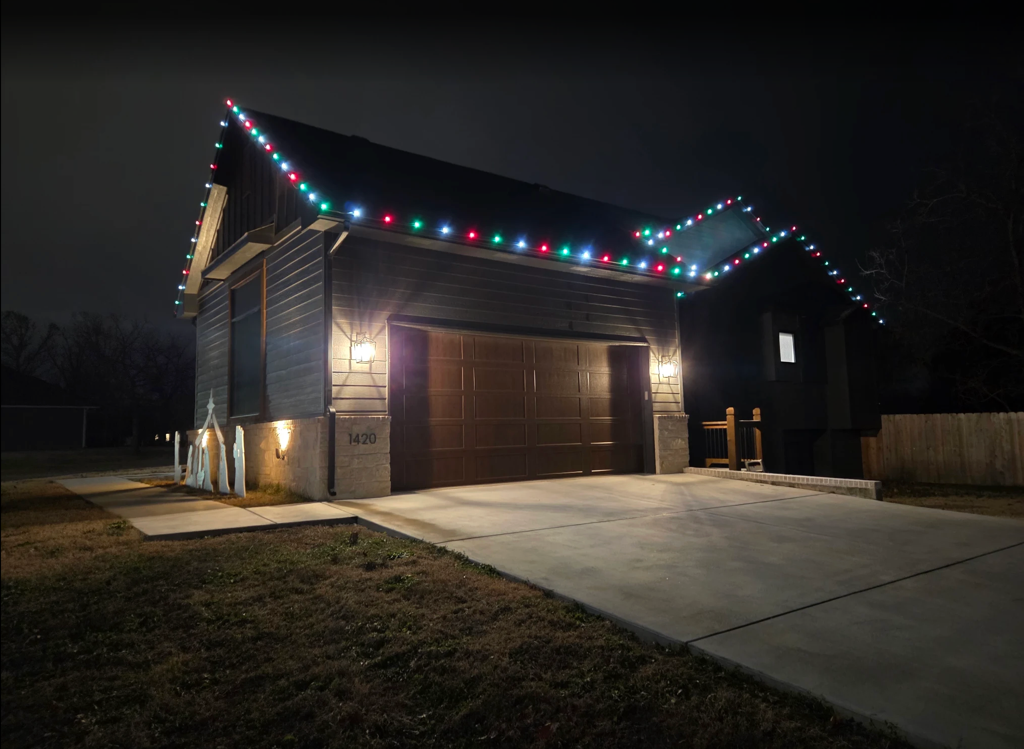 residential holiday permanent lighting on perimeter of the roof