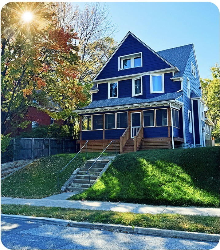 exterior of a blue home 