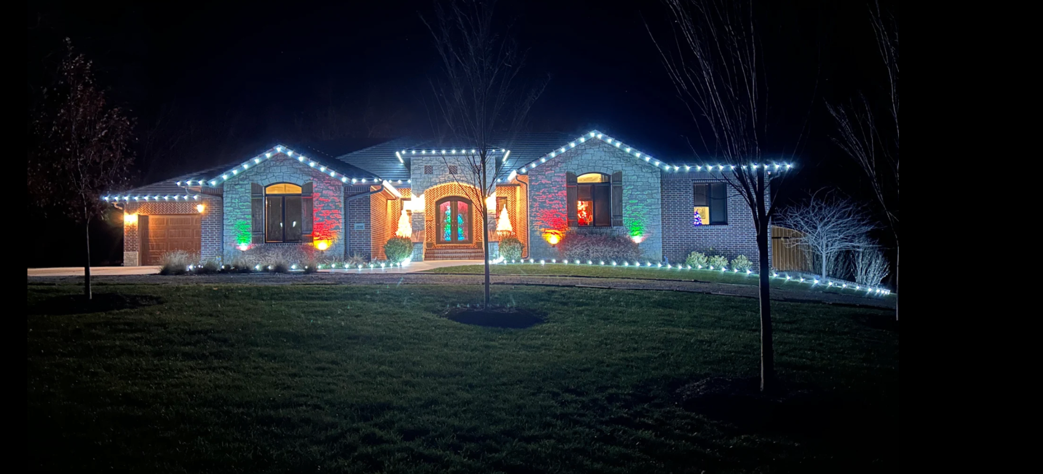 residential holiday permanent lighting on perimeter of the roof