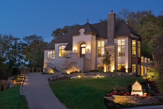 exterior of a home with outdoor lighting