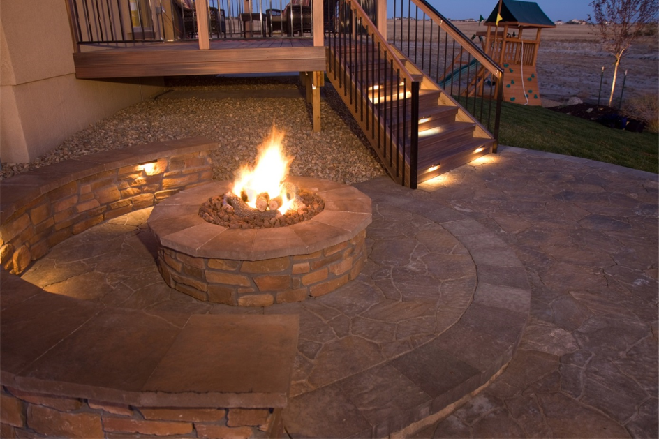 outdoor seating lighting around fire pit 