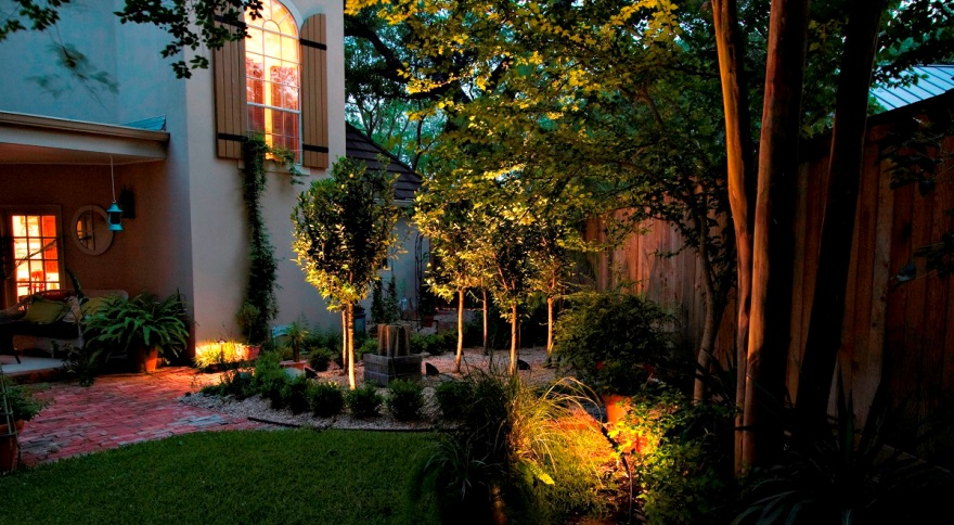 backyard with outdoor lighting