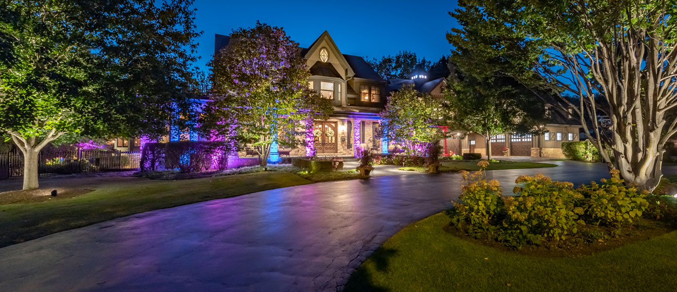 A house with purple lightsDescription automatically generated with low confidence
