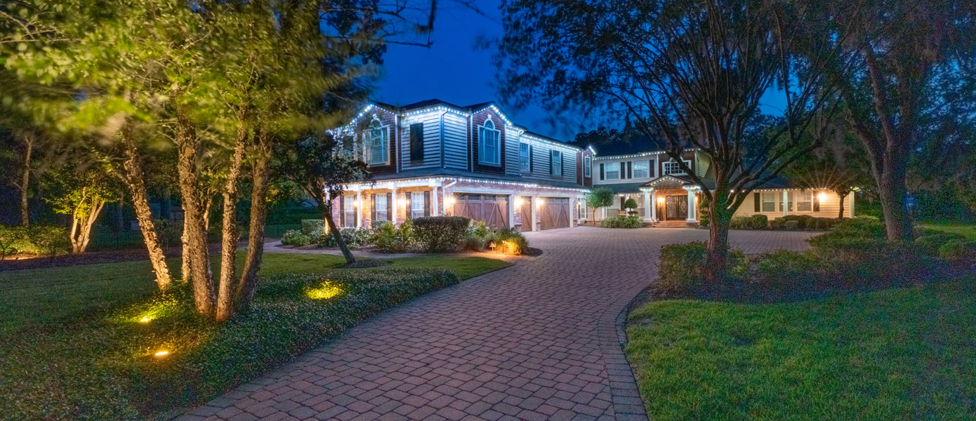 a house with outdoor lighting