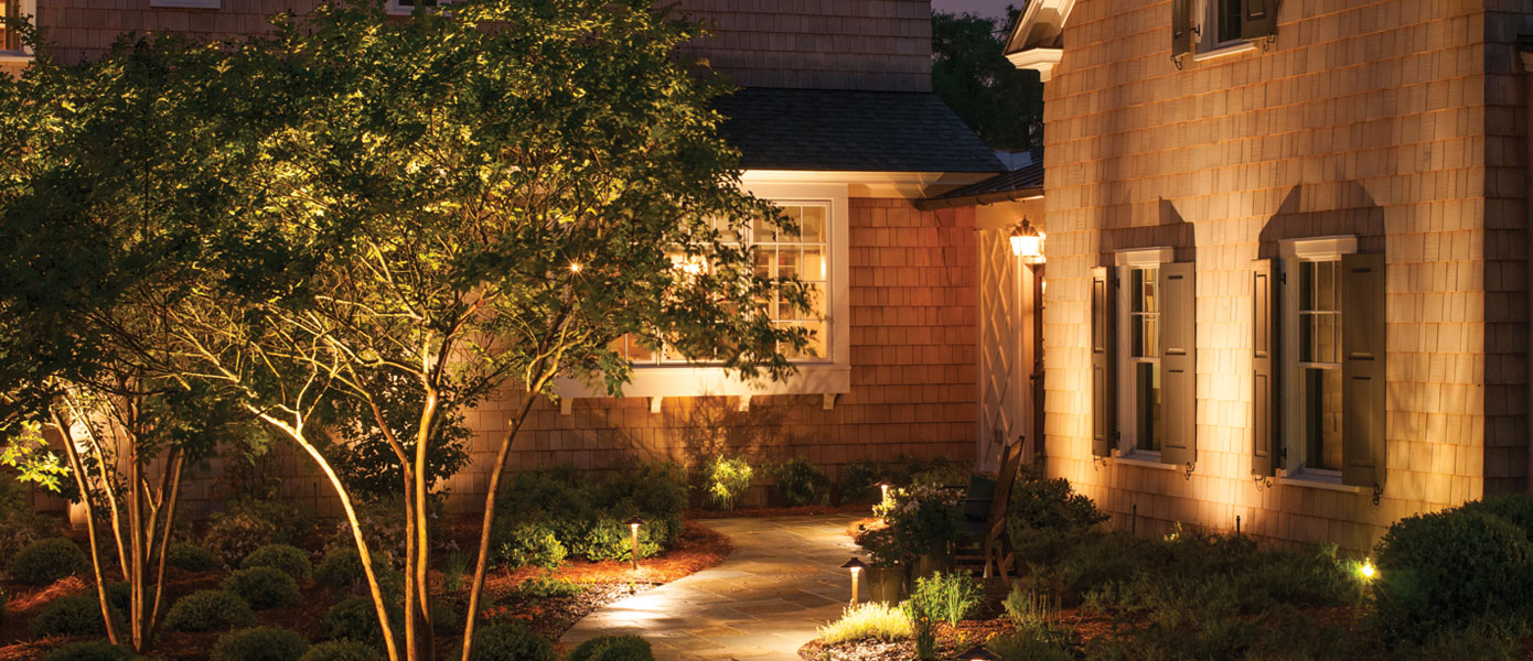 A picture containing outdoor, building, plant, homeDescription automatically generated