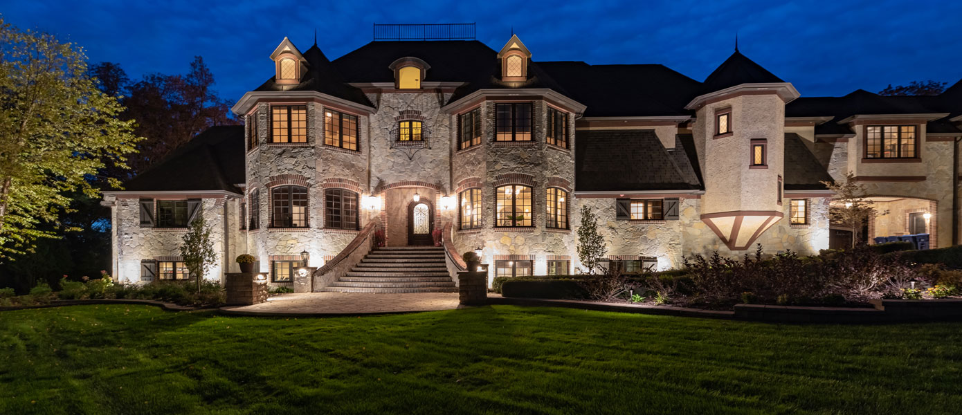 A picture containing building, outdoor, house, skyDescription automatically generated
