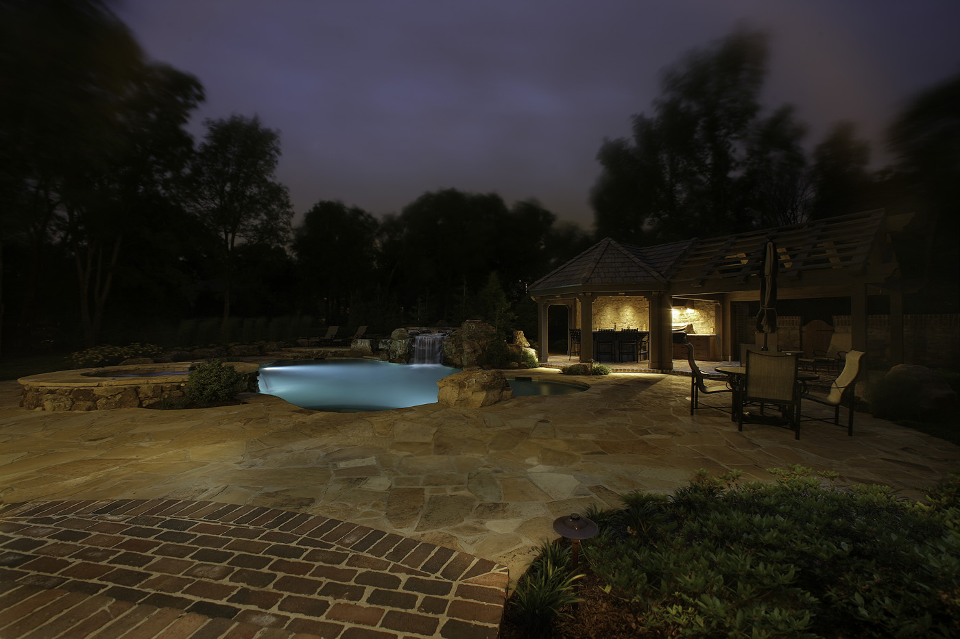 Deck and pool with professional lighting