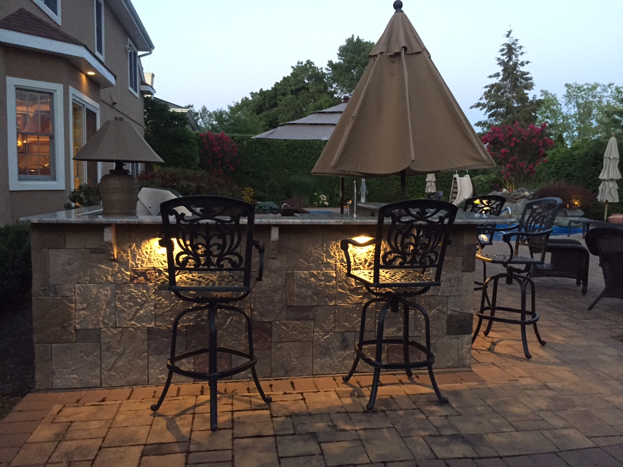 Backyard in the Woodlands with residential outdoor lighting
