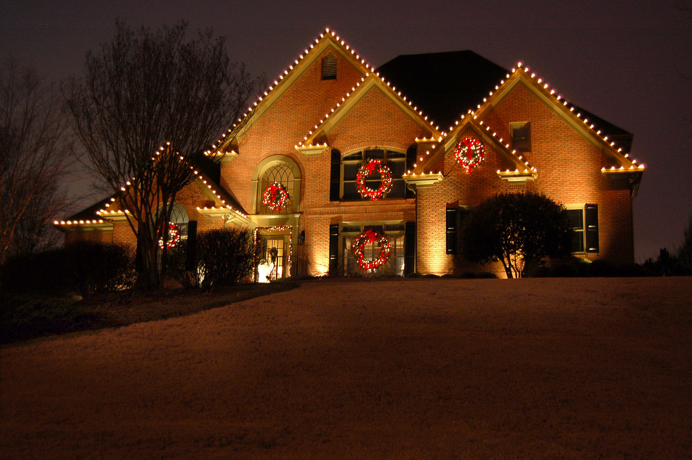Home with holiday lighting and decorations