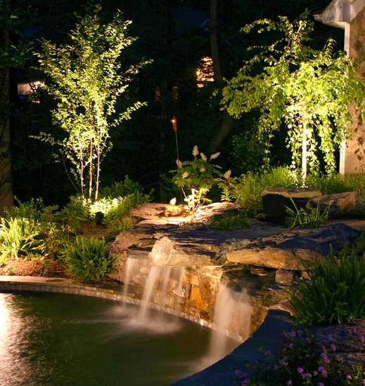 Pool waterfall with lighting