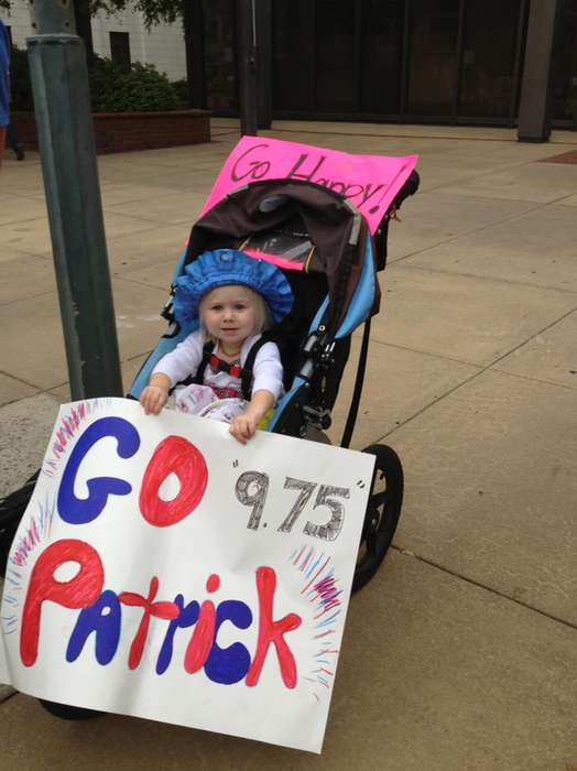 Pat Otis' granddaughter with a cheer sign for Patrick