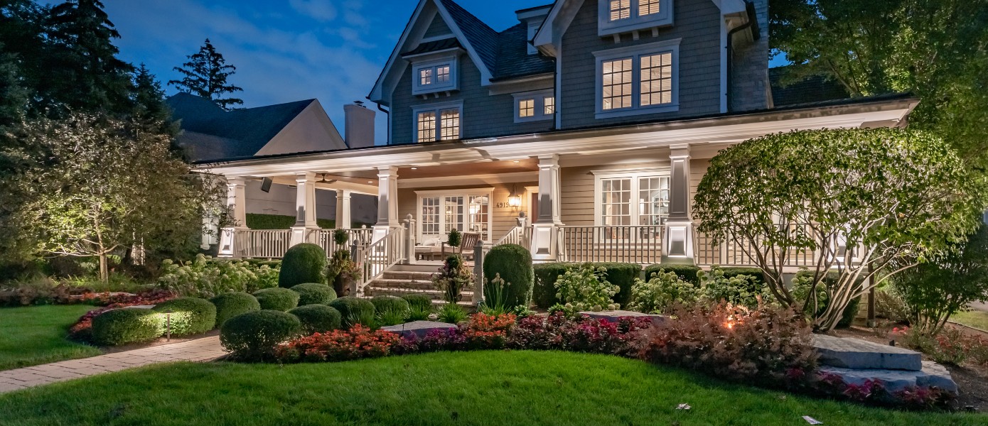 home with landscape lighting
