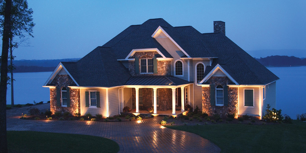 Residence that is next to lake and has specialty lighting