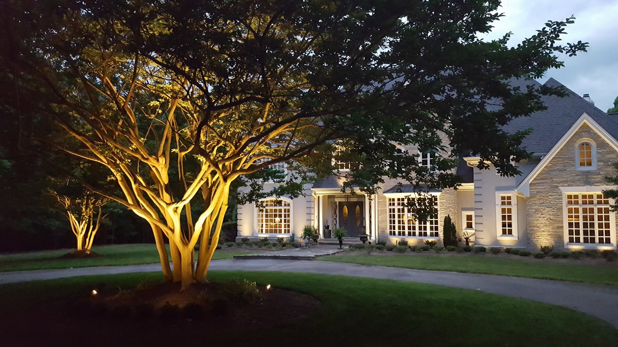 Home entrance and front yard with special lighting
