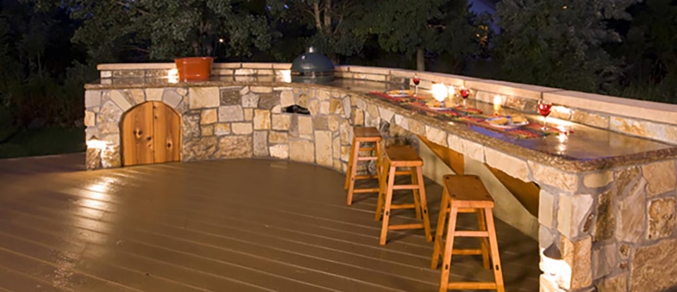 A bar stools on a deck

Description automatically generated