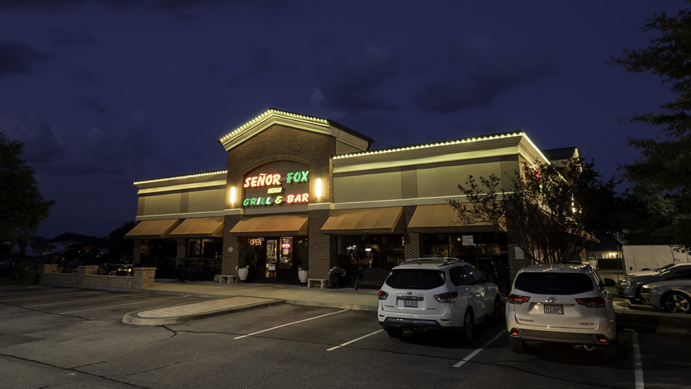 types of commercial outdoor lighting: permanent roofline lights