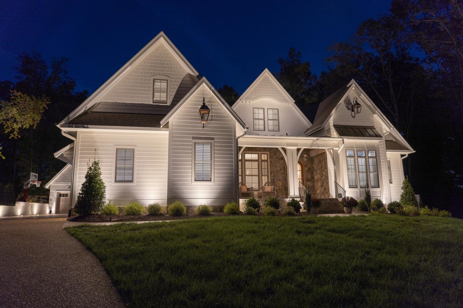 home with outdoor lighting